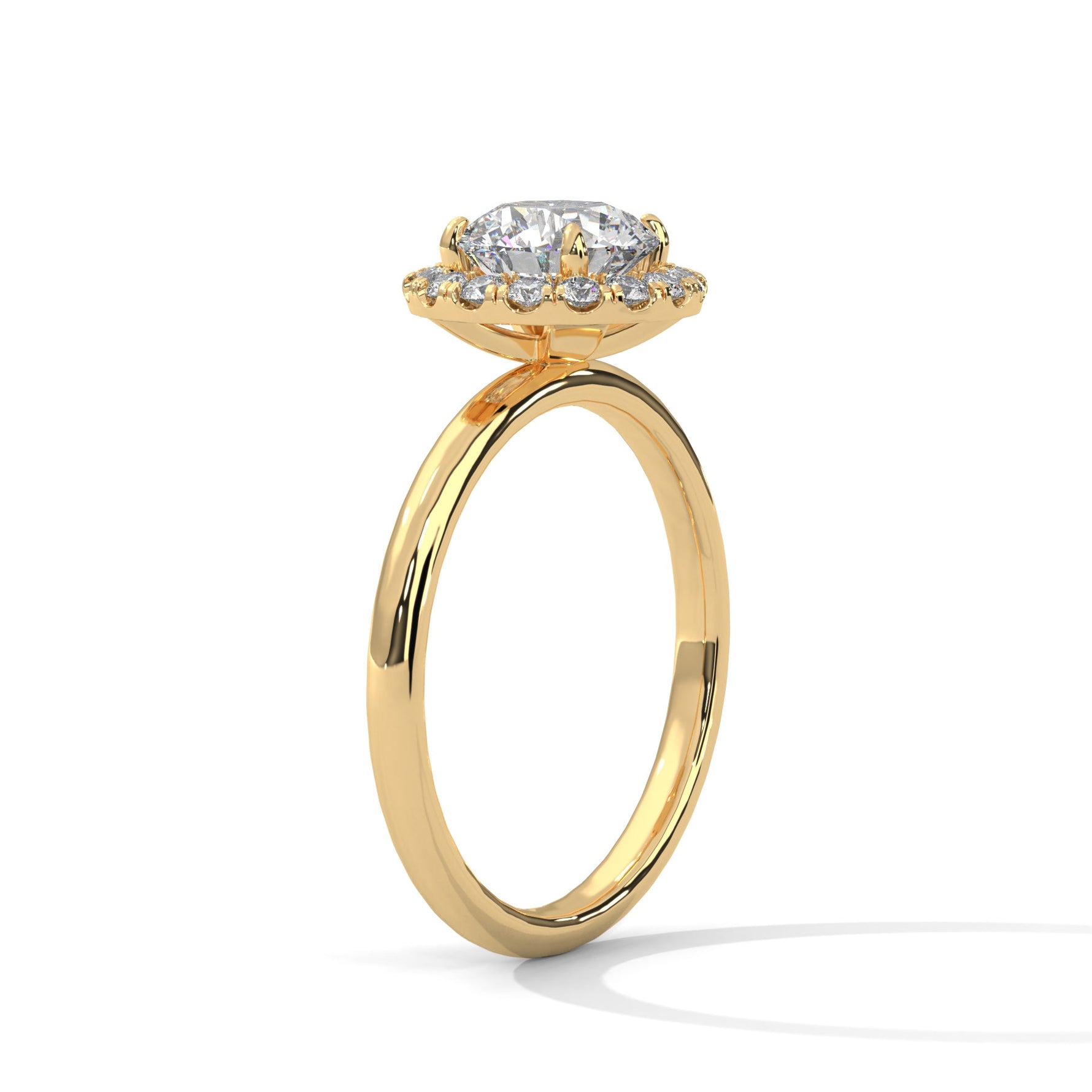 Gold ring with a large diamond on a white background 