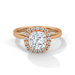 Rose gold ring with a large diamond on a white background 