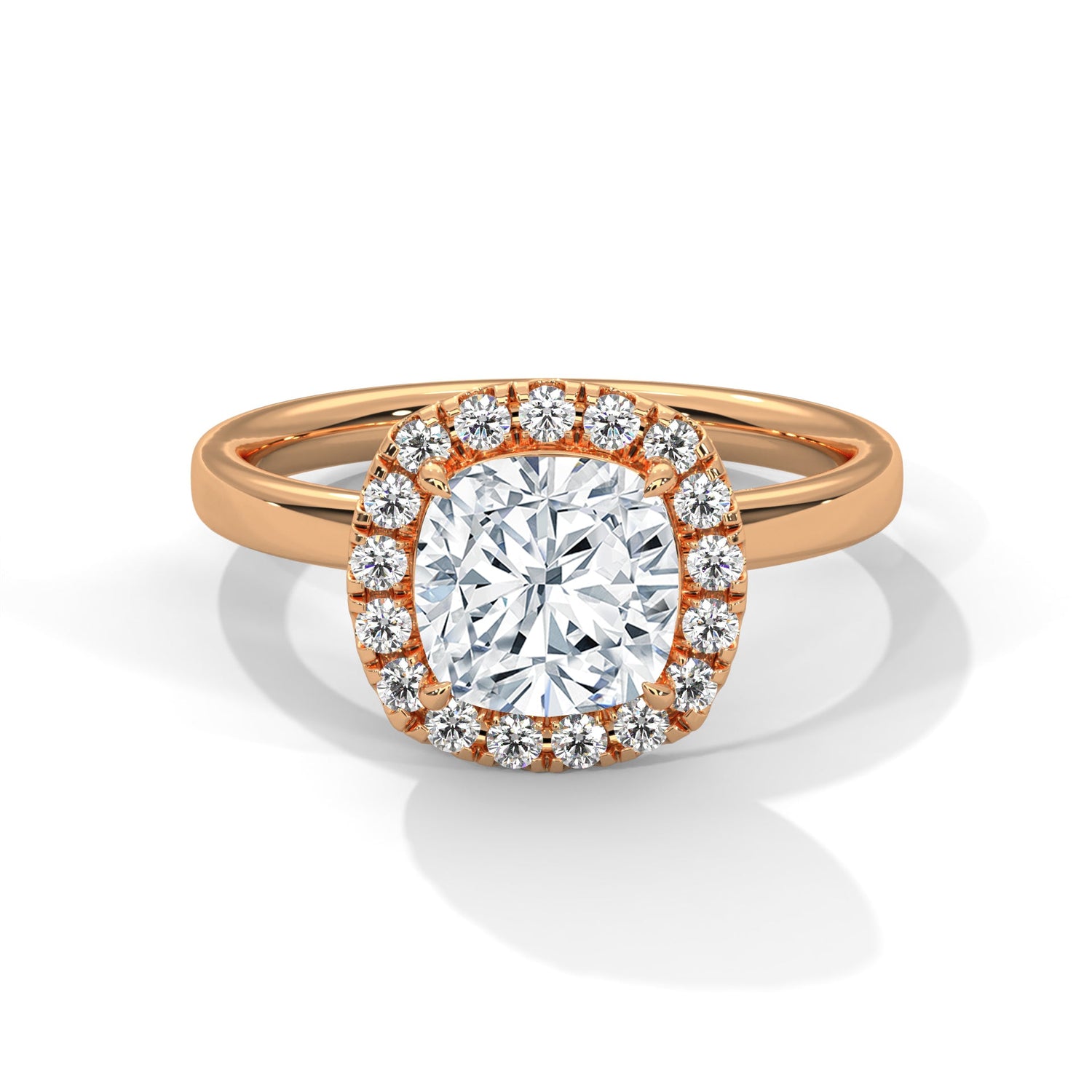 Rose gold ring with a large diamond on a white background 