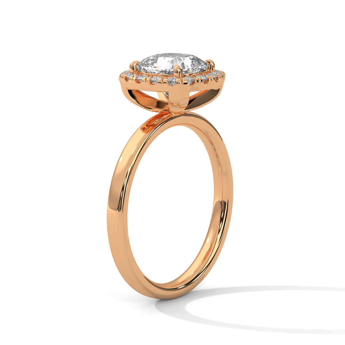 Rose gold ring with a large diamond on a white background 
