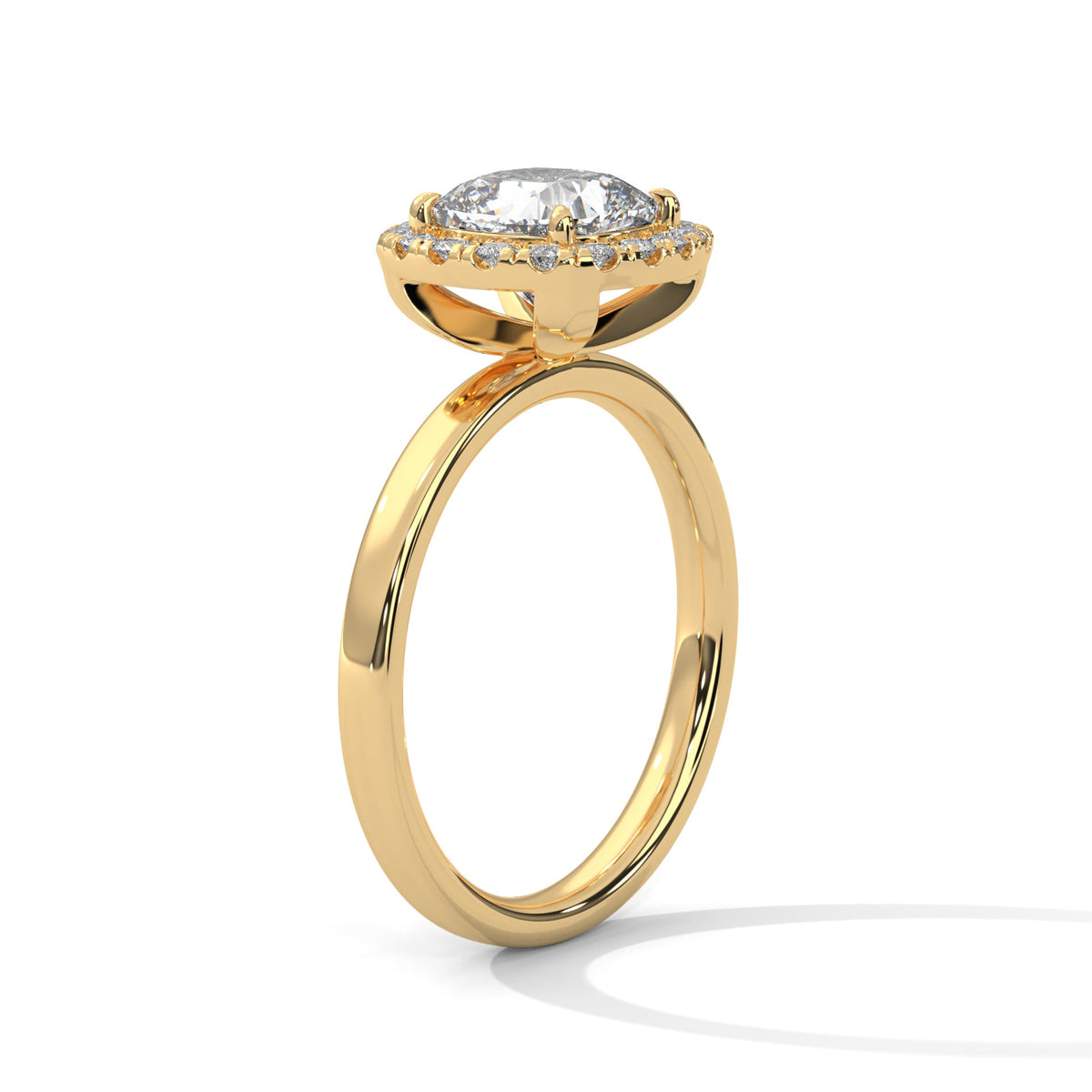Gold ring with a large diamond on a white background 