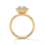 Gold ring with a large diamond on a white background 