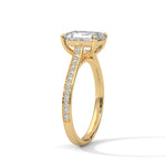 Gold ring with a large diamond on a white background 