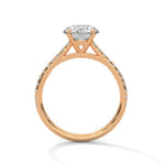 Rose gold ring with a large diamond on a white background 