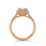 Rose gold ring with a large diamond on a white background 