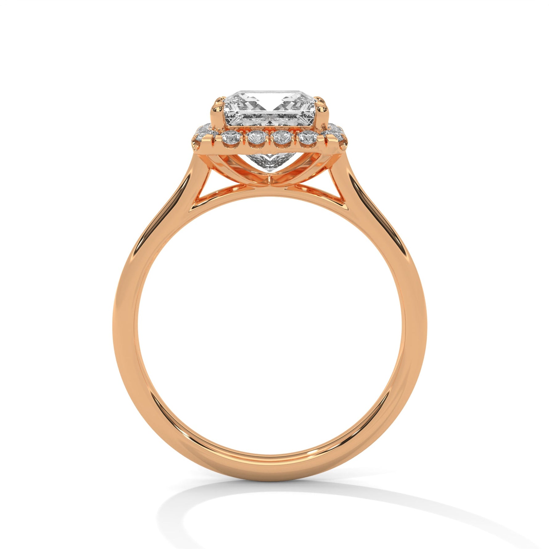 Rose gold ring with a large diamond on a white background 