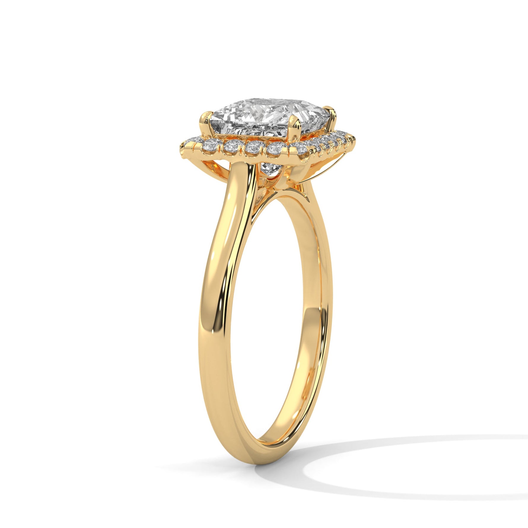Gold ring with a large diamond on a white background 