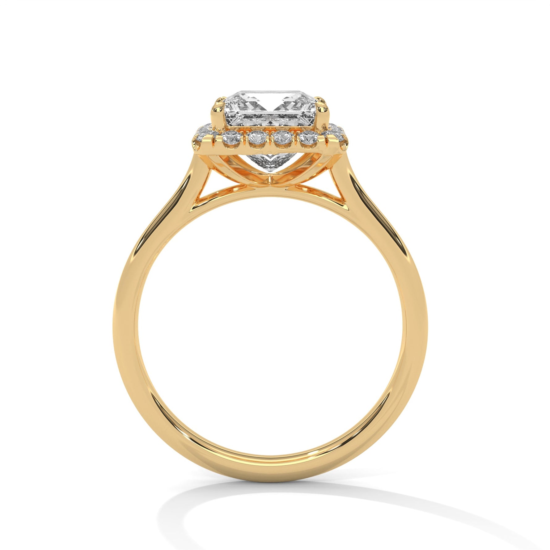 Gold ring with a large diamond on a white background 