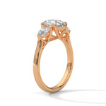 Rose gold ring with a large diamond on a white background 