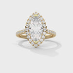 Gold ring with a large central diamond and smaller diamonds around on a white background 