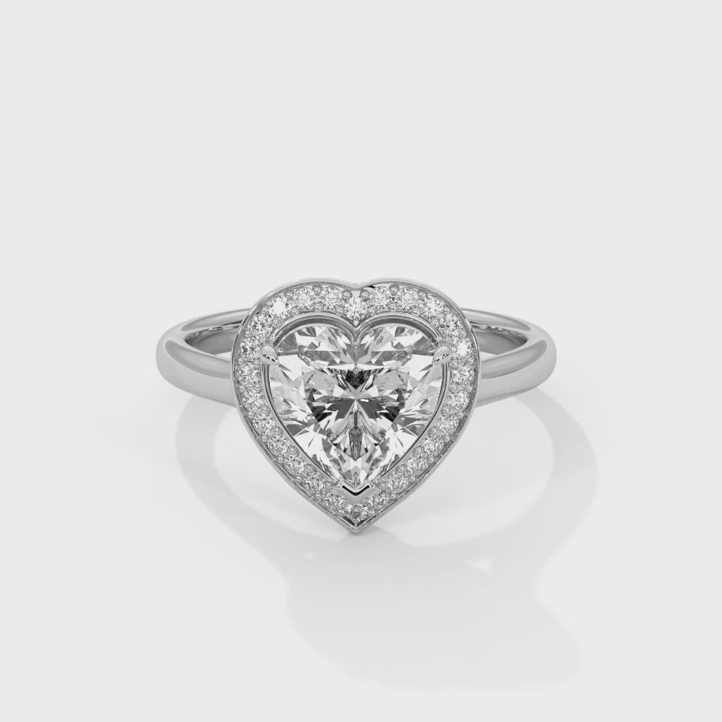 Diamond ring with a white gold band on a white background #white-gold